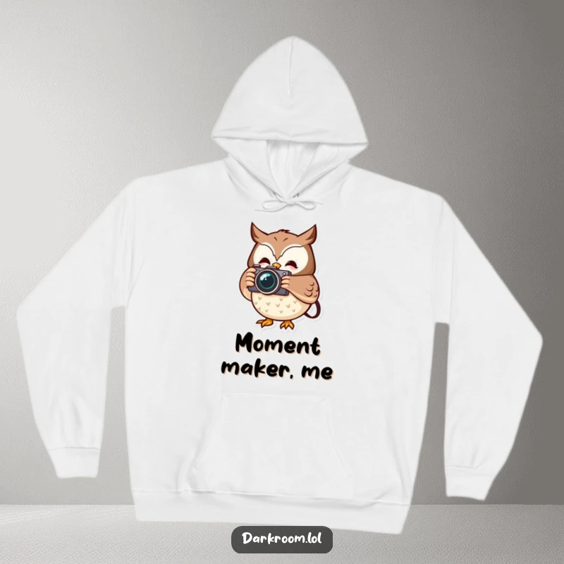 Funny cheerful owl photographer hoodie, holding a camera, capturing a fleeting moment, offering warmth and nocturnal wisdom.